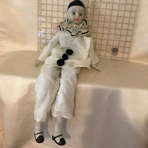 Long limbed creepy clown doll vintage music box
